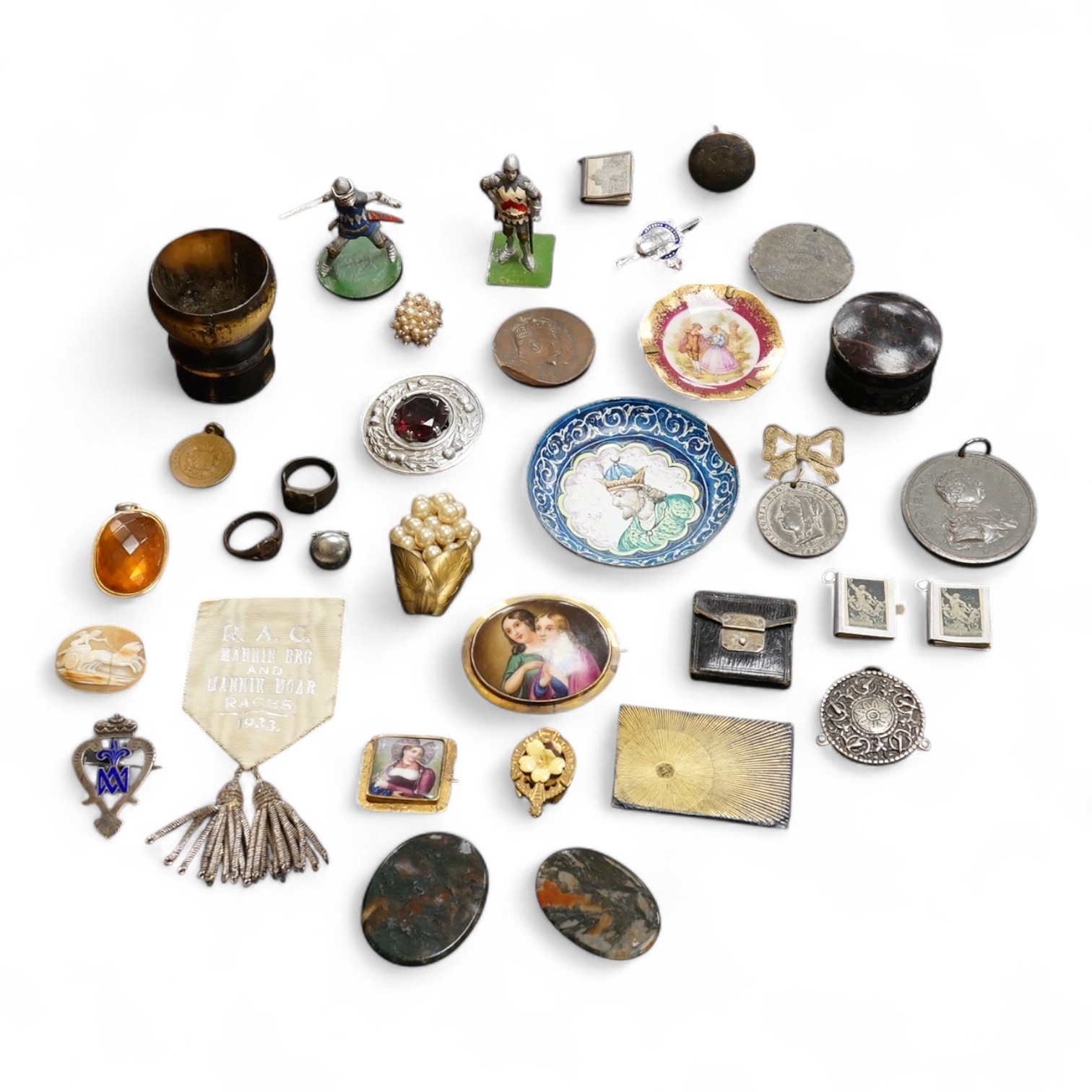Objects of vertu and medals, including two Paris porcelain painted brooches, a leather cased almanac for 1827 and a painted ‘I Love You’ metal patch box